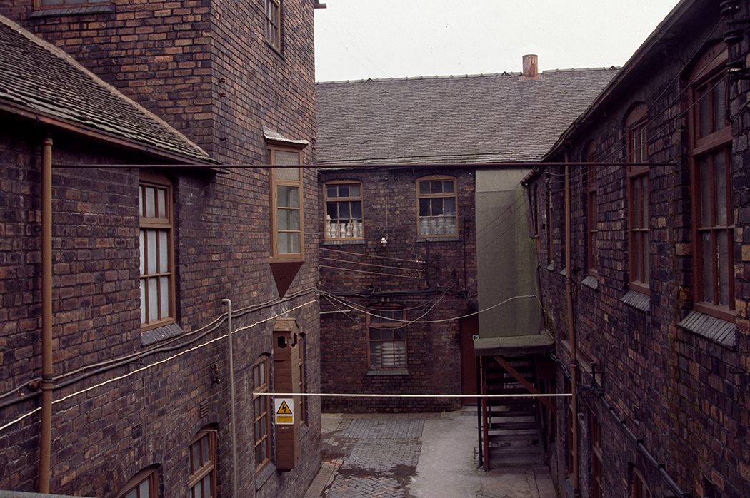 Image may contain City Road Street Urban Brick and Alley