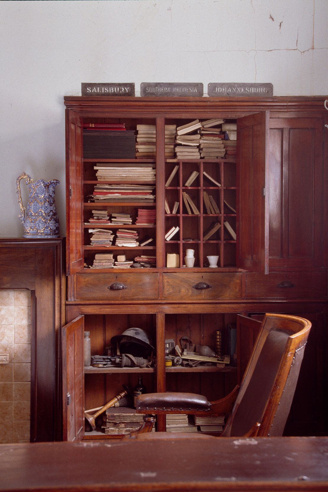 Image may contain Furniture Closet Cupboard Wood Chair Device Hammer Tool Cup Indoors and Interior Design