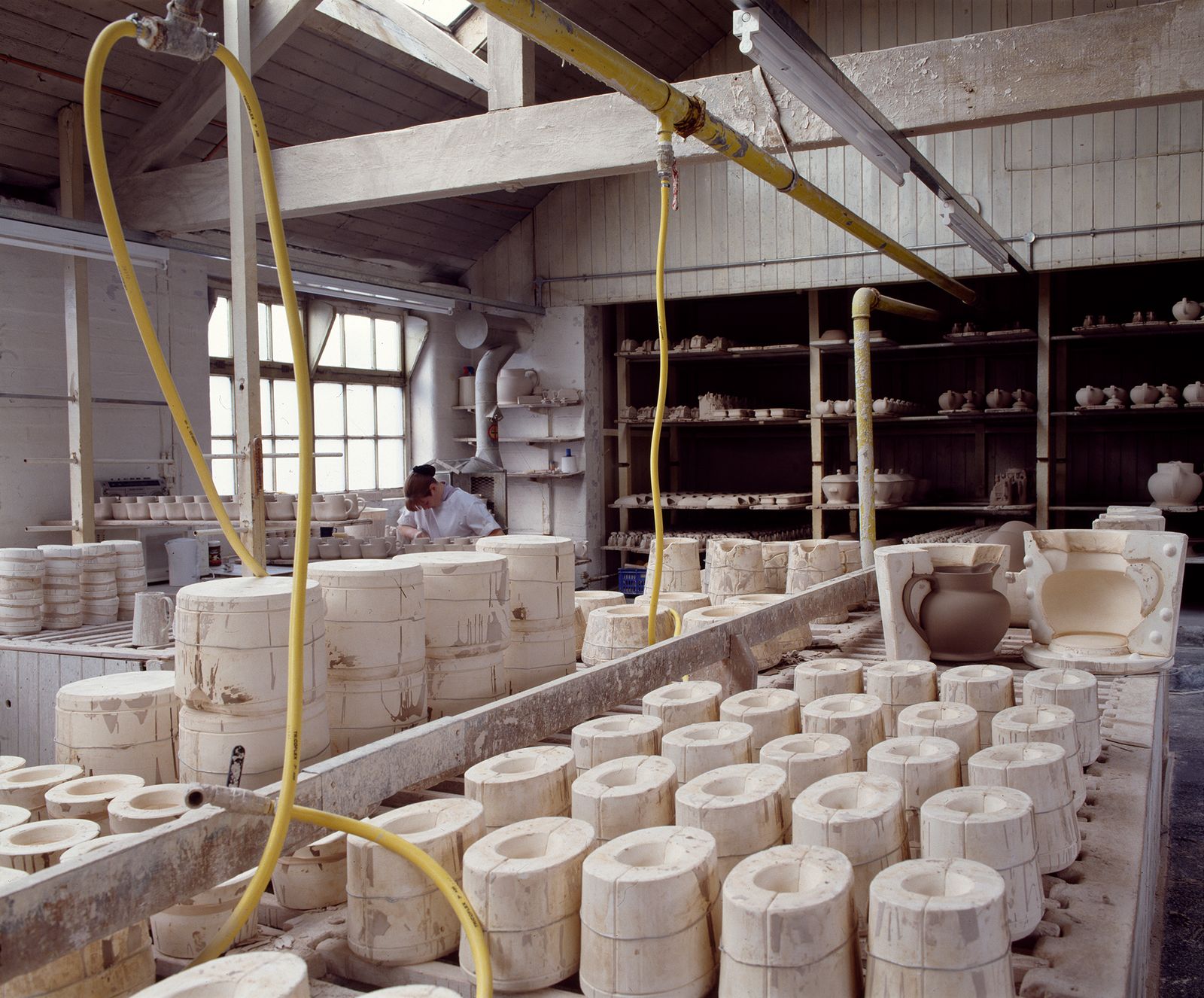 Image may contain Person Architecture Building and Factory