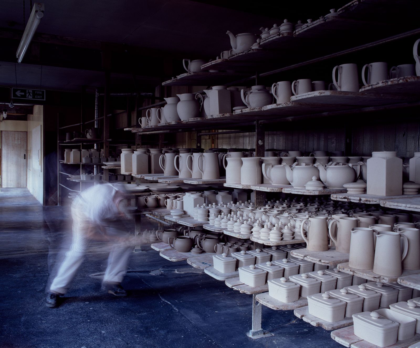 Image may contain Pottery Art Porcelain Cookware Pot Clothing Footwear Shoe Person and Cup