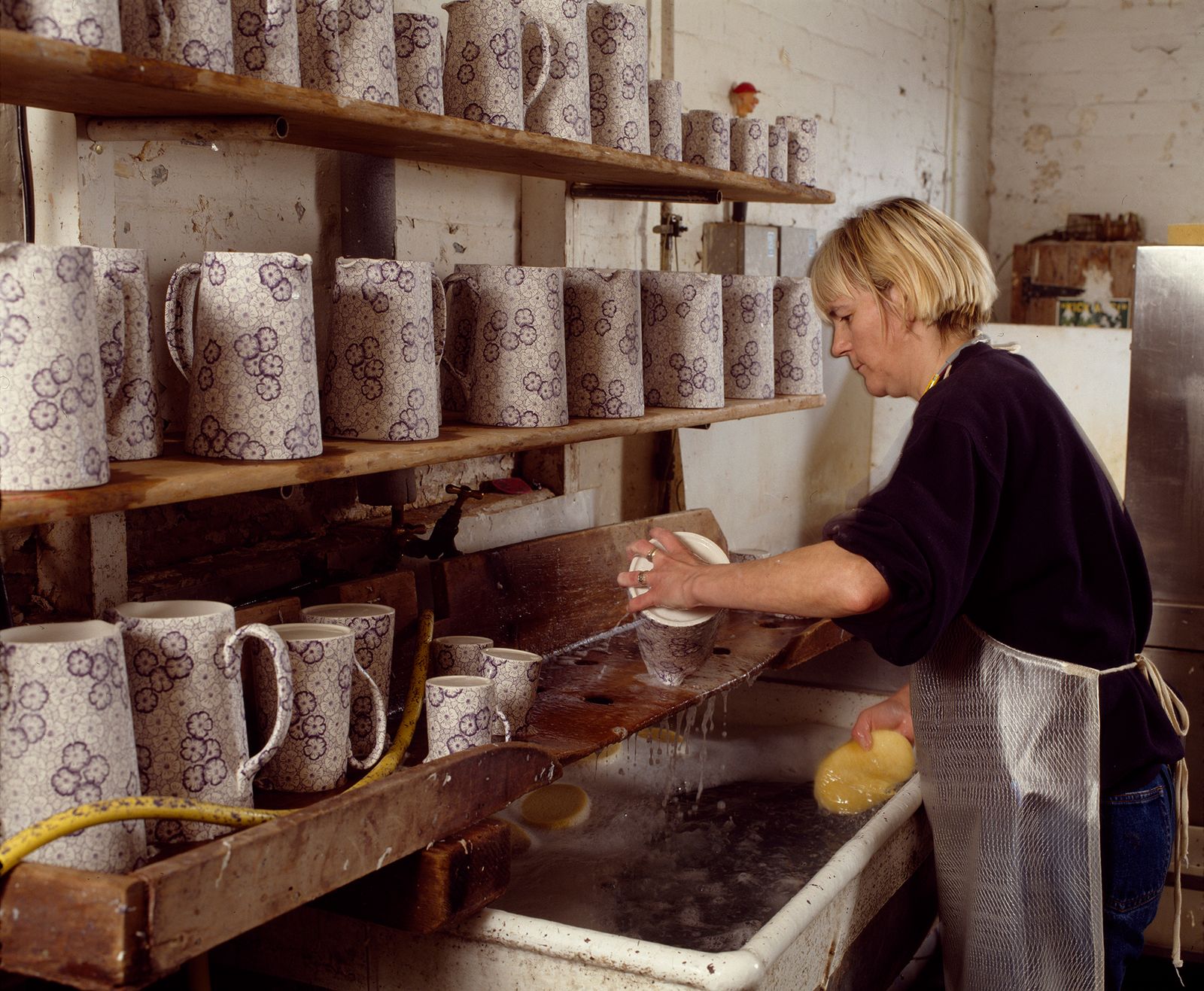 Image may contain Body Part Hand Person Adult Tape Cup Bread Food and Sink