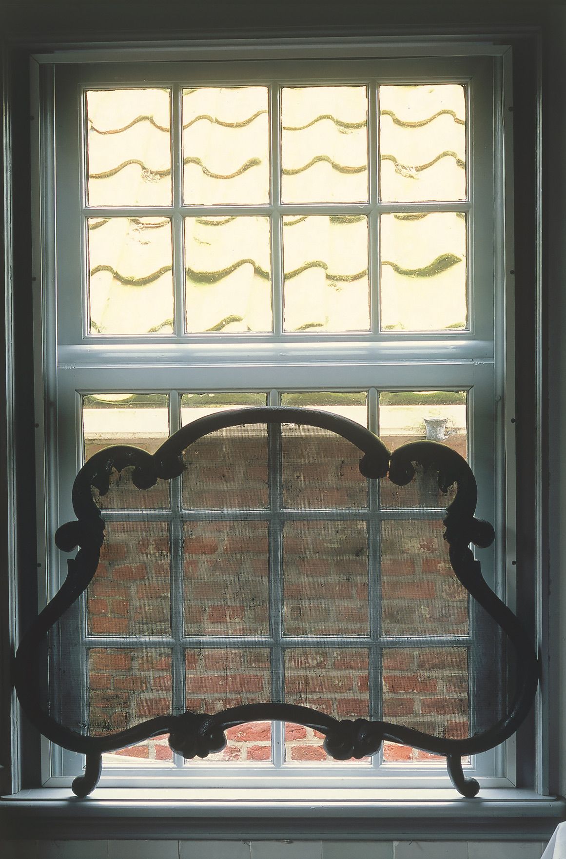 Image may contain Window Windowsill and French Window