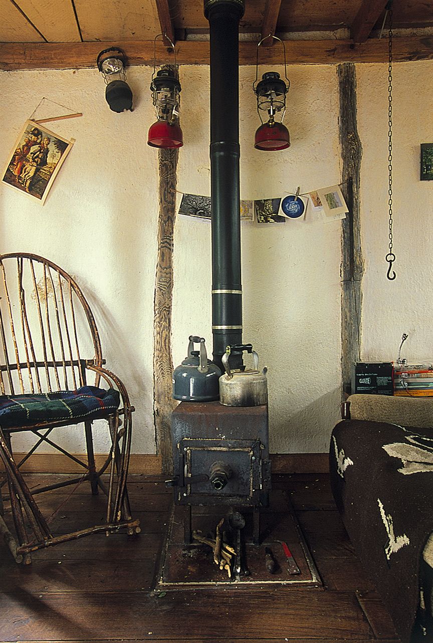 Image may contain Chair Furniture Lamp Person Table Art Painting and Couch