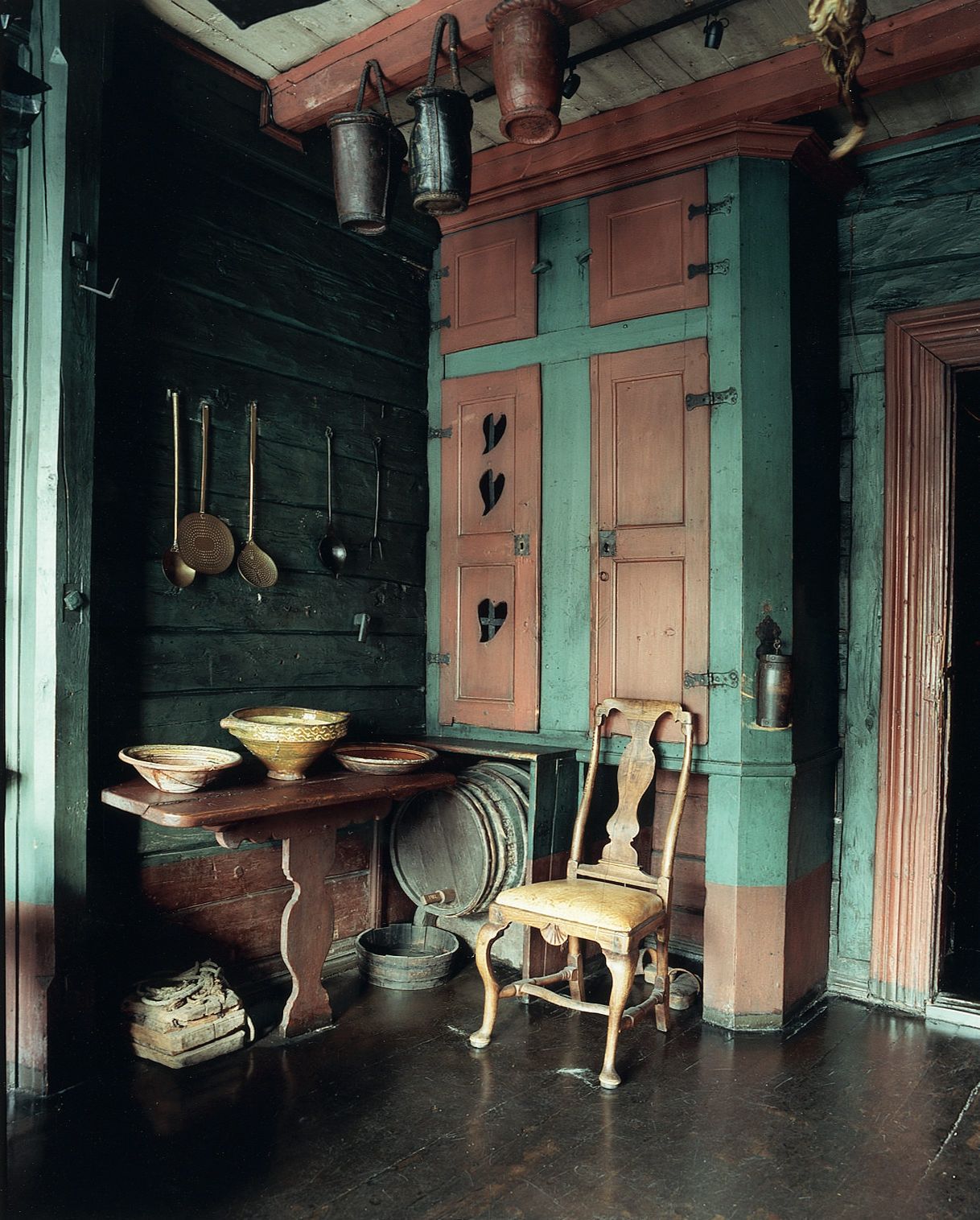 Image may contain Floor Chair Furniture Indoors Interior Design Wood Desk Table Flooring Architecture and Building
